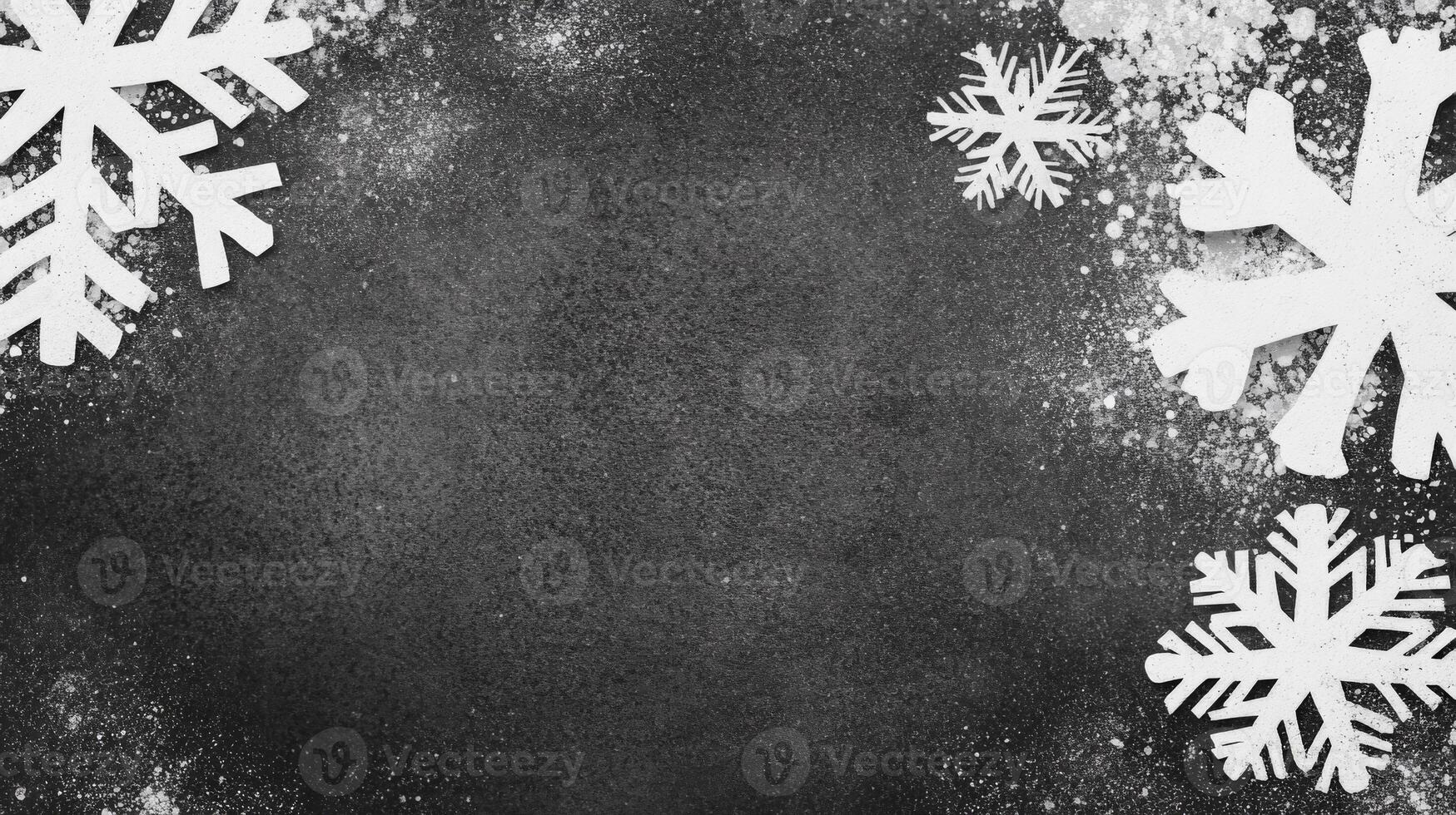 White Snowflake Cutouts with Snow Dust on a Dark Textured Background photo