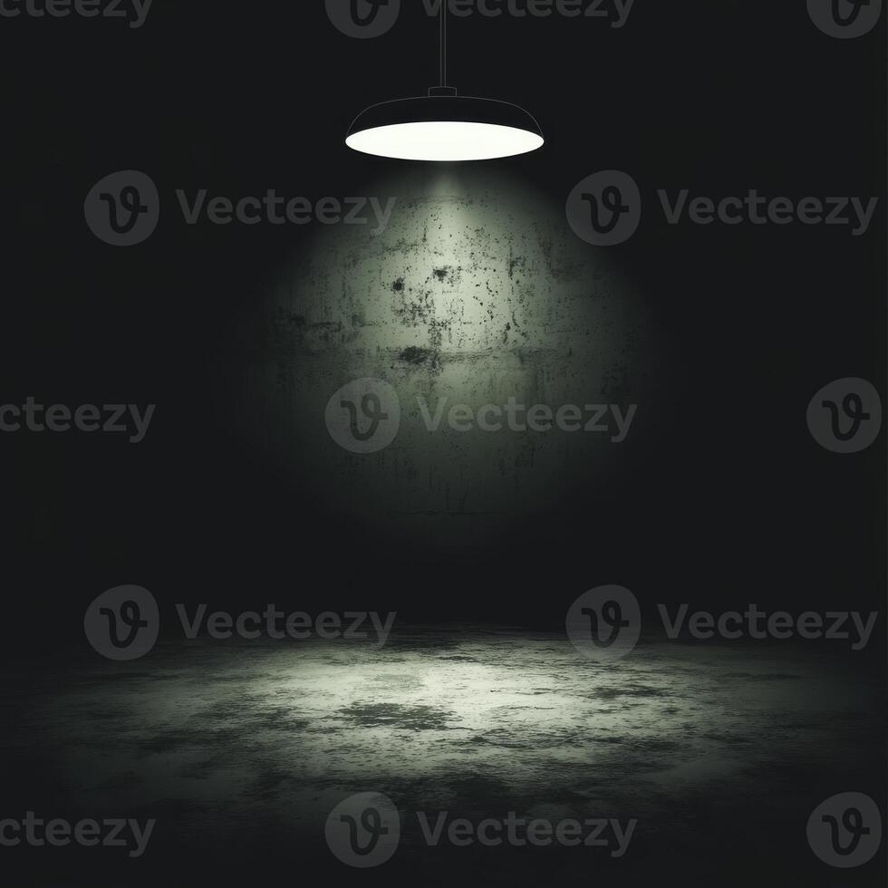 Single Pendant Lamp Illuminating a Grungy Concrete Wall and Floor Dimly photo