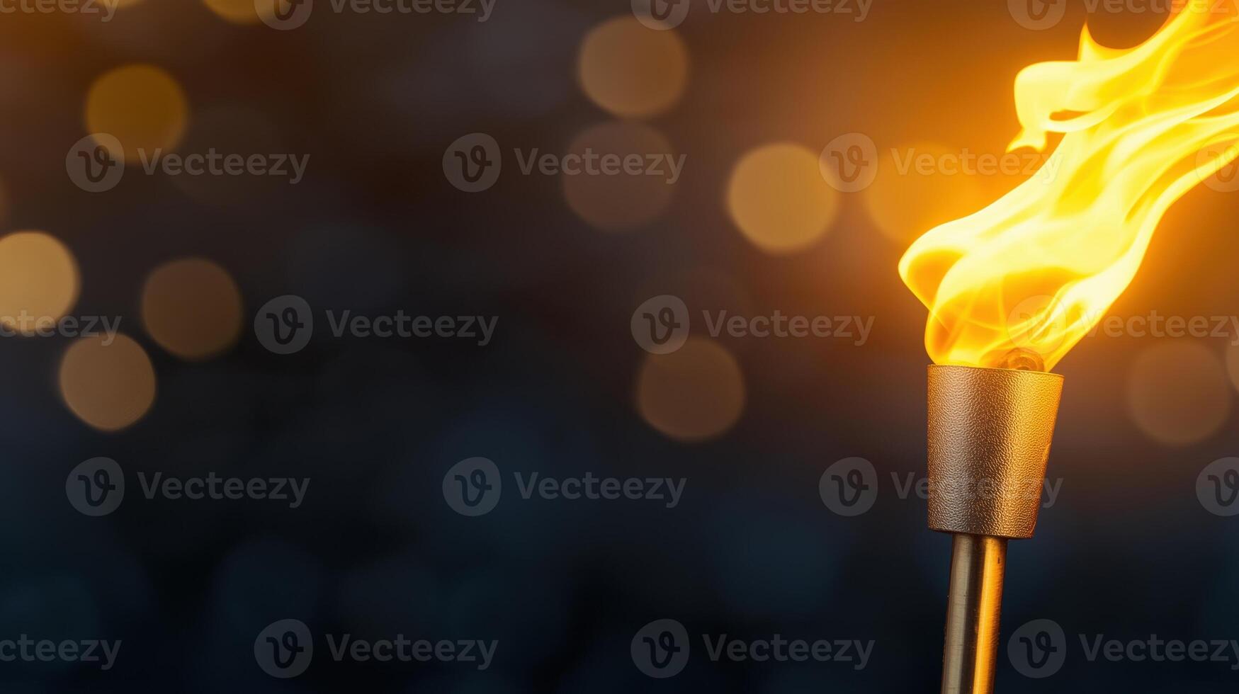 Digital Torch with Flame Illuminating a Dark Background for Social Media and Landscape Use photo
