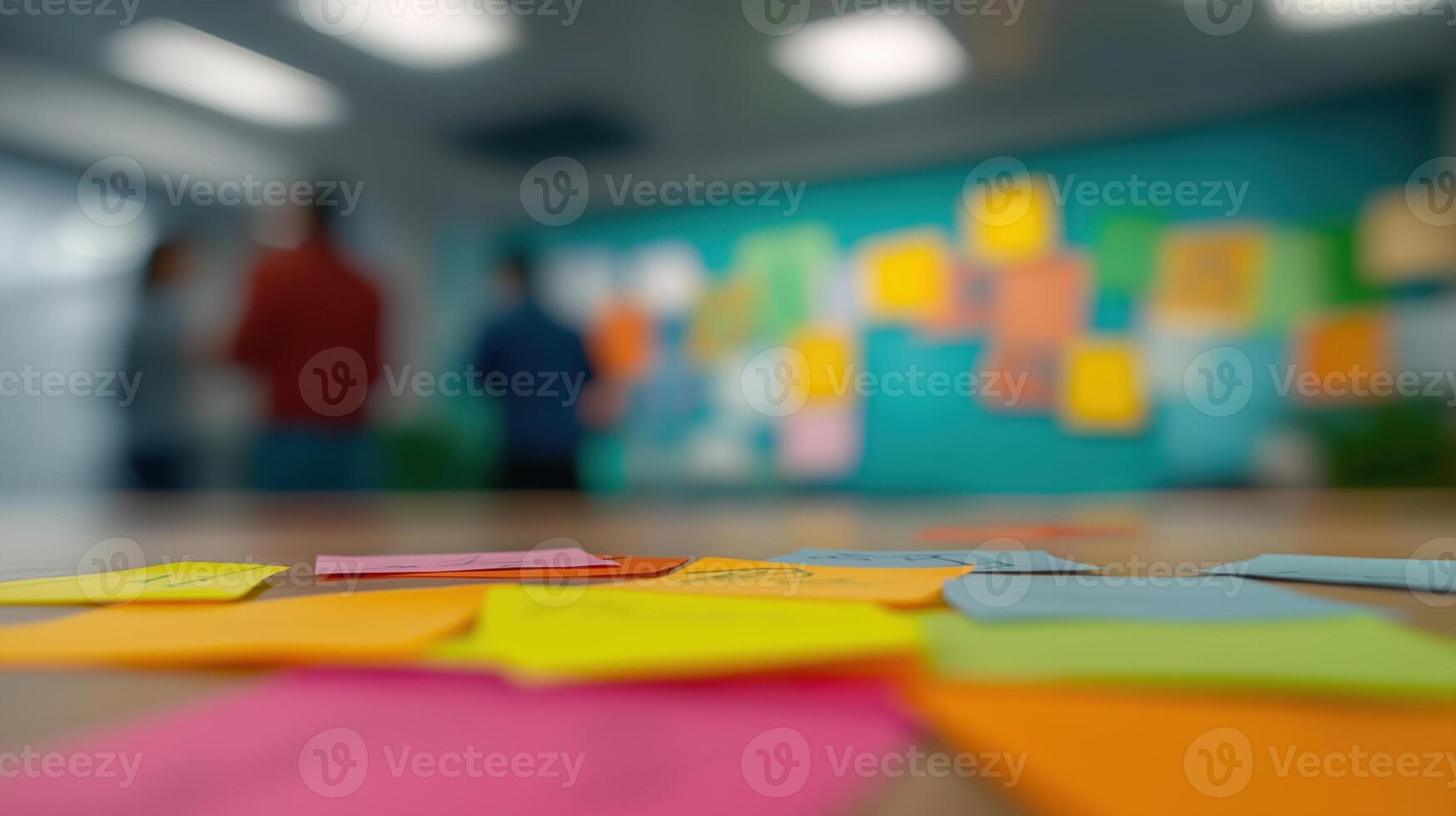 Colorful Sticky Notes on Table with Blurred Background of Team Collaboration in Modern Office Space photo