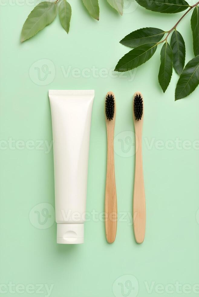 Eco-friendly oral care set with bamboo toothbrushes and natural toothpaste photo