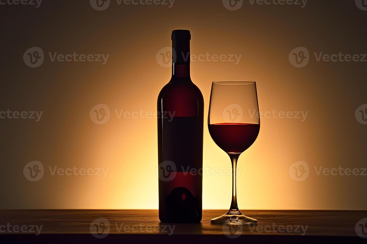Red Wine Bottle and Glass Silhouette Against Warm Sunset Backdrop photo