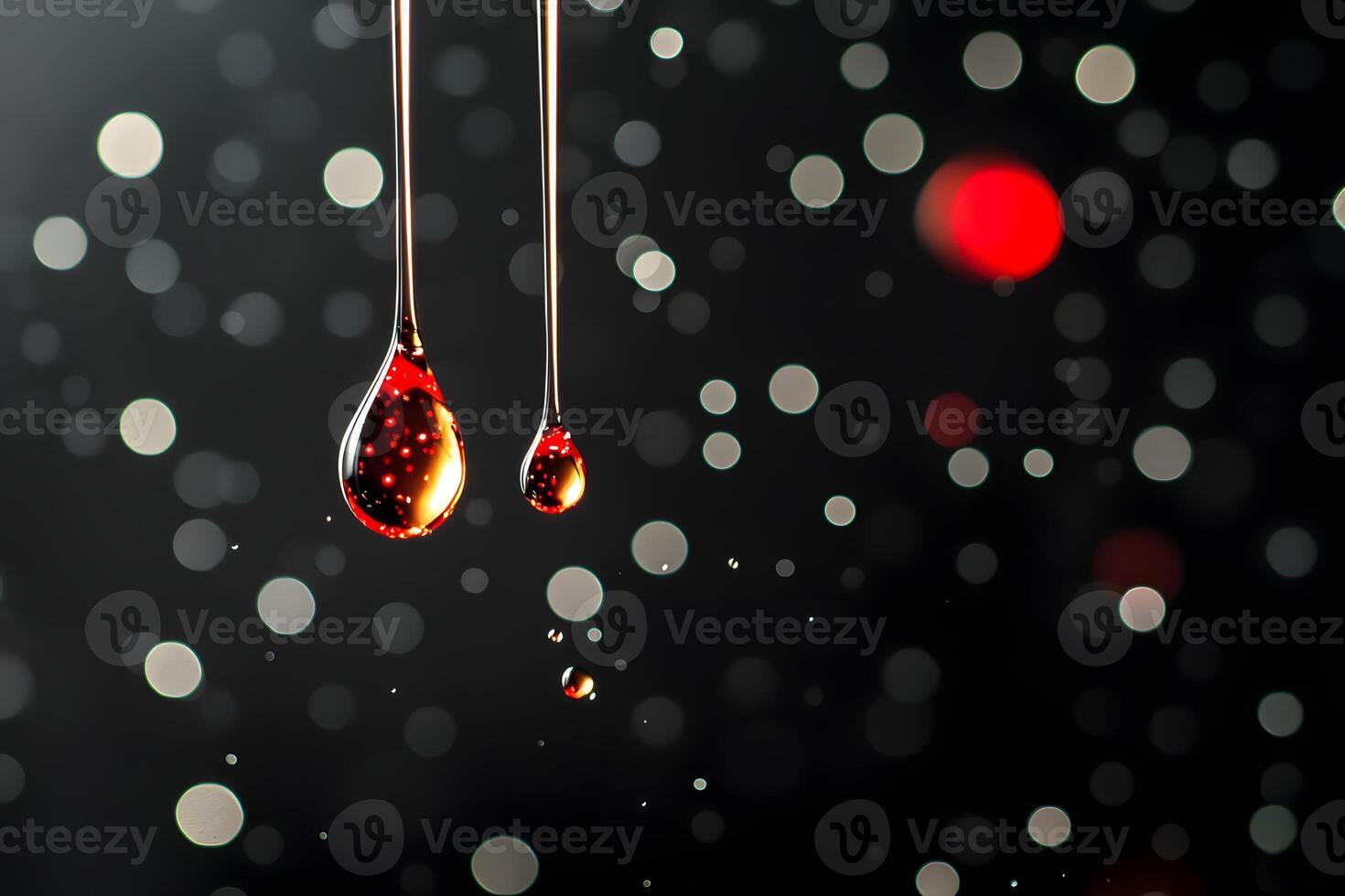 Abstract Macro Photography of Two Falling Drops of Liquid with Bokeh Background photo