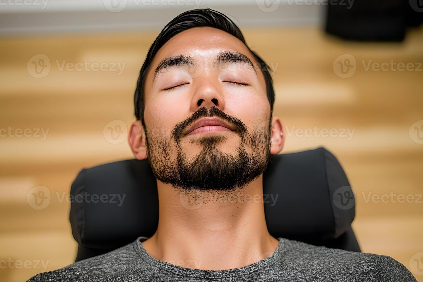 A man with his eyes closed and his eyes closed photo