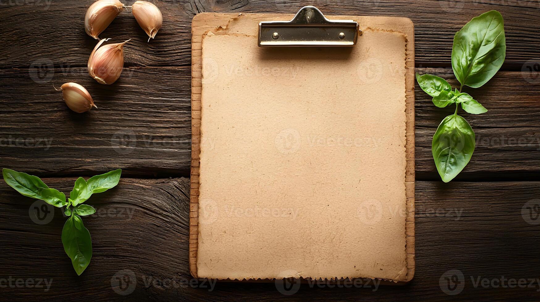 Rustic Wooden Clipboard with Blank Parchment Paper Garlic Cloves and Fresh Basil Leaves photo