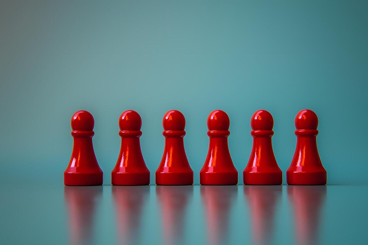 Row of Red Game Pieces on Teal Background Team Unity or Competition Concept photo