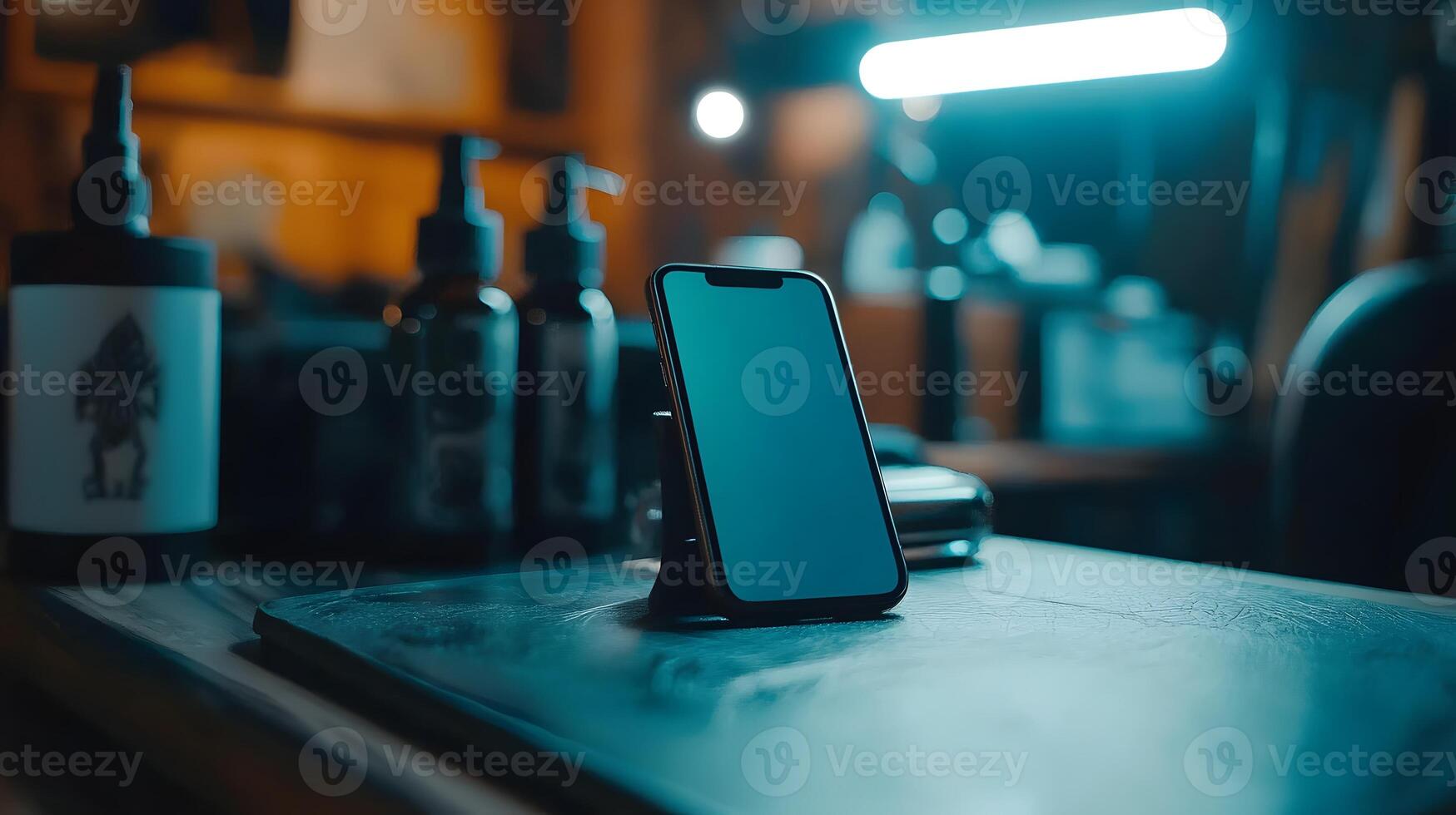 Modern Smartphone Mockup on Desk in Tattoo Studio Teal Lighting Blank Screen photo