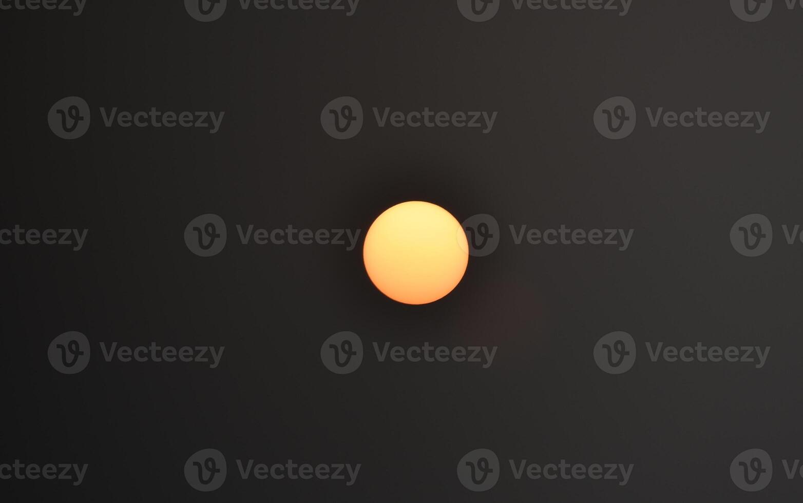 Snap of orange sun at morning in black background photo