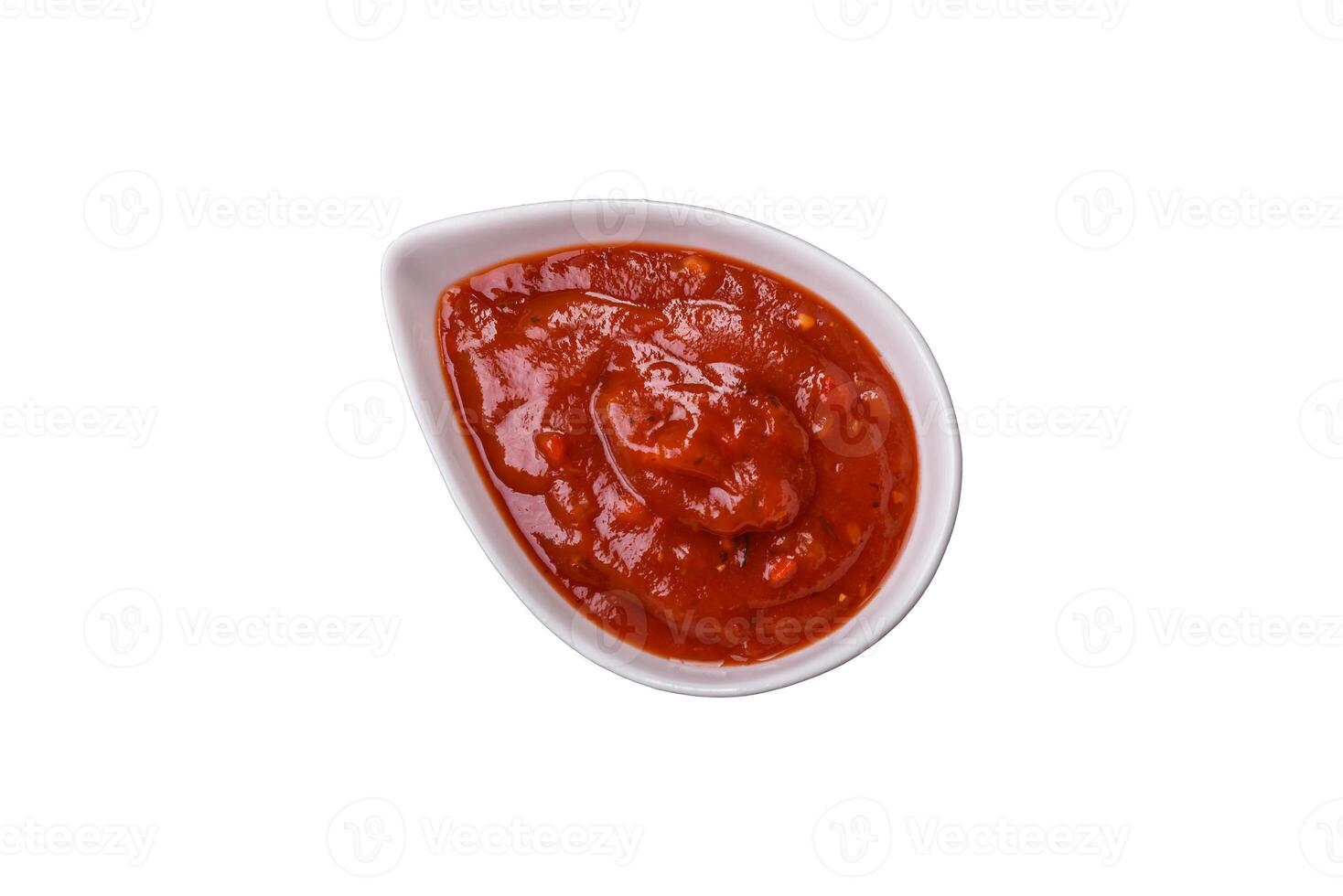 Red sauce or ketchup with salt and spices photo