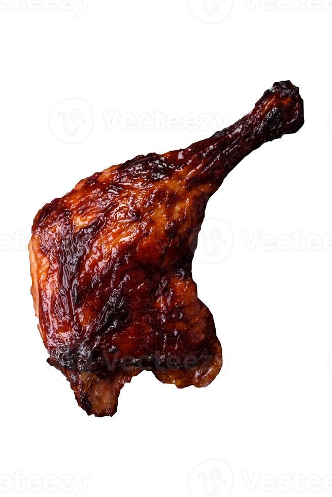 Duck, chicken leg or thigh grilled on a white background isolated on white photo