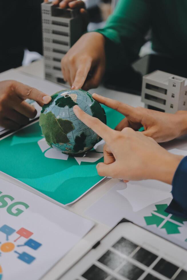 A group of people are working on a green earth photo
