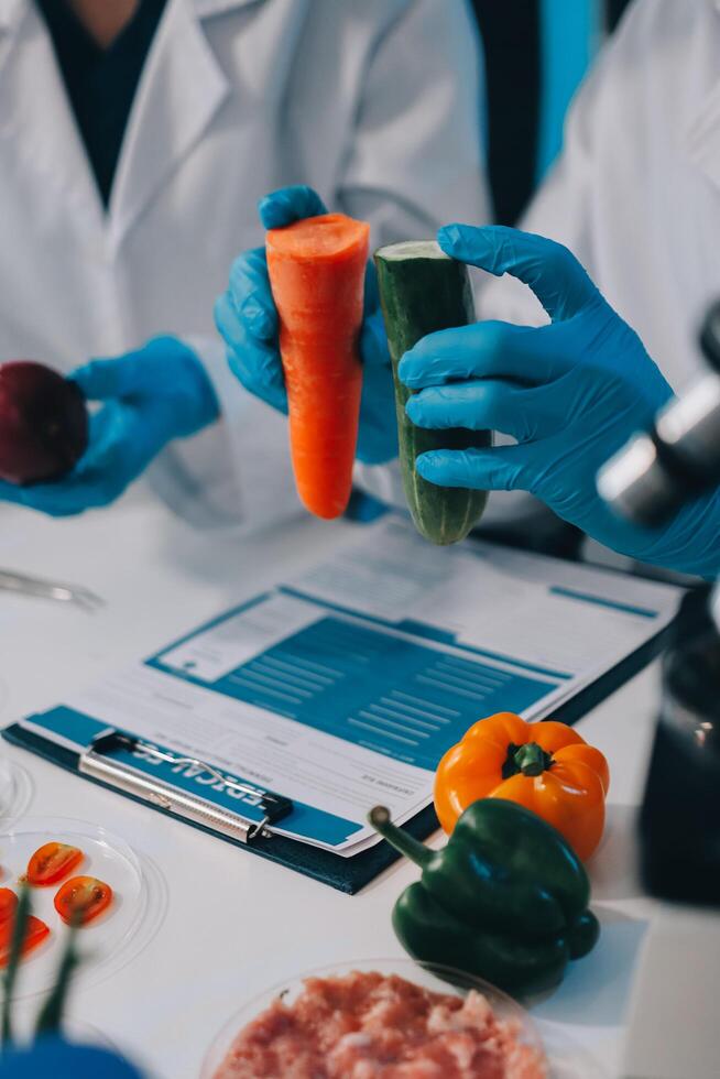 Two people in lab coats photo