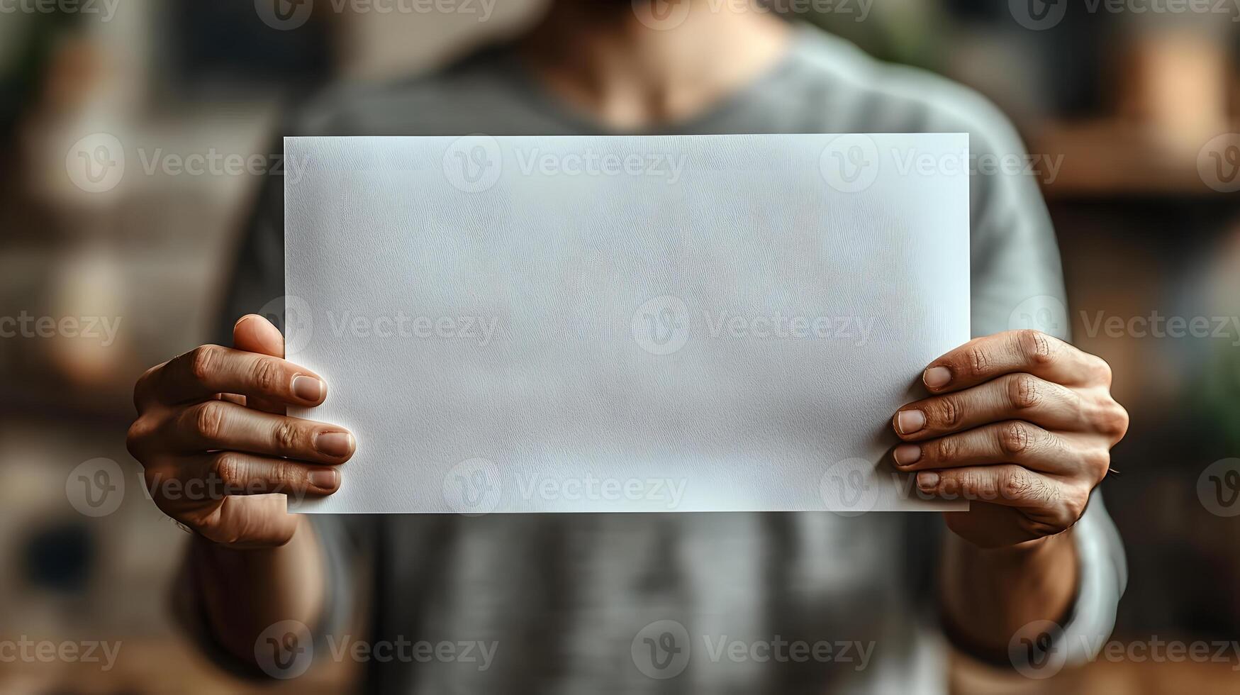 Person holding a blank newspaper with both hands clean white space for mockup. photo