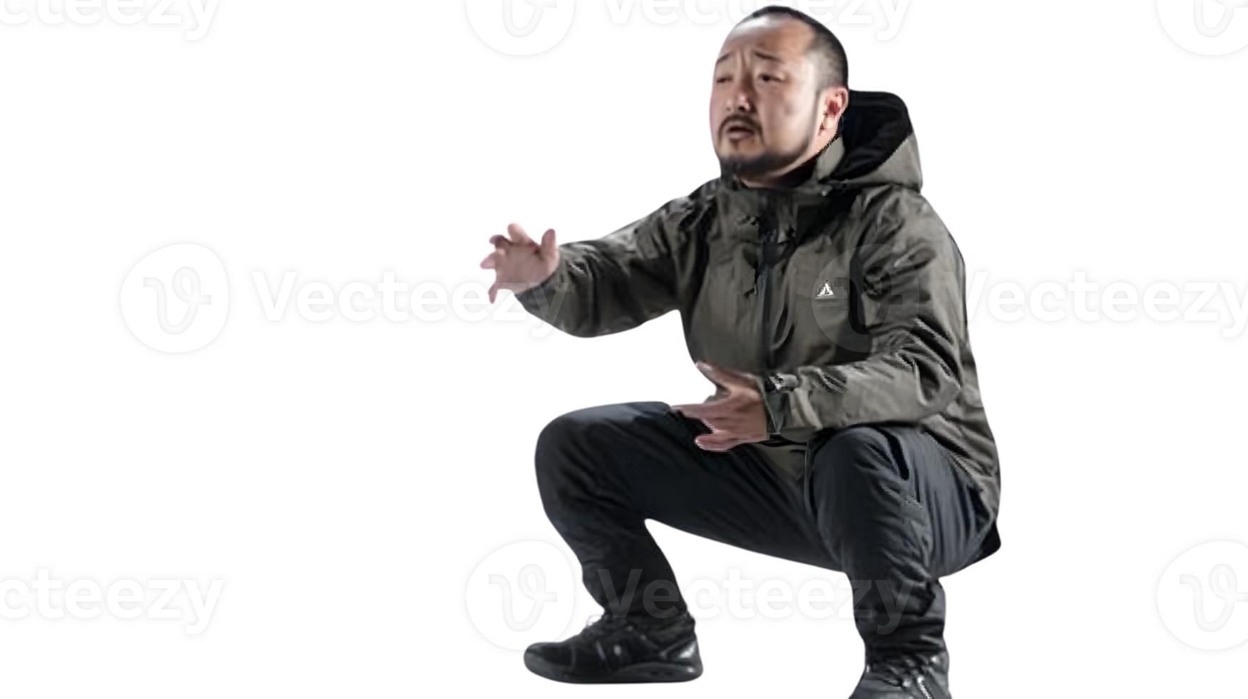 A man in a crouched position wearing outdoor gear ready for action or exercise png