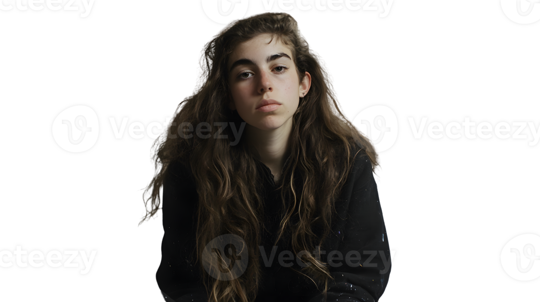 A young individual with long wavy hair wearing a black hoodie against a dark background png