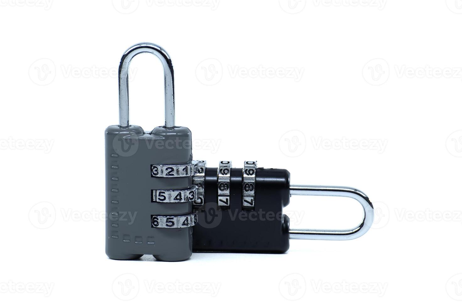 Two combination locks, one gray and one black, offer security and peace of mind. photo