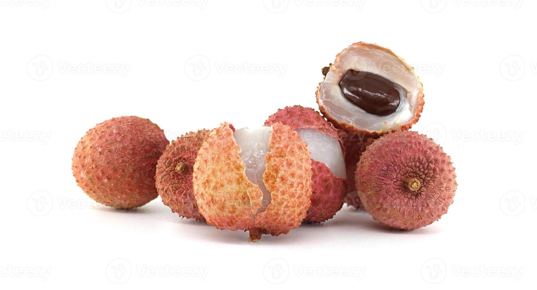 Freshly Plucked Lychee Fruits on White Background Displaying Their Juicy Pulp and Seed photo