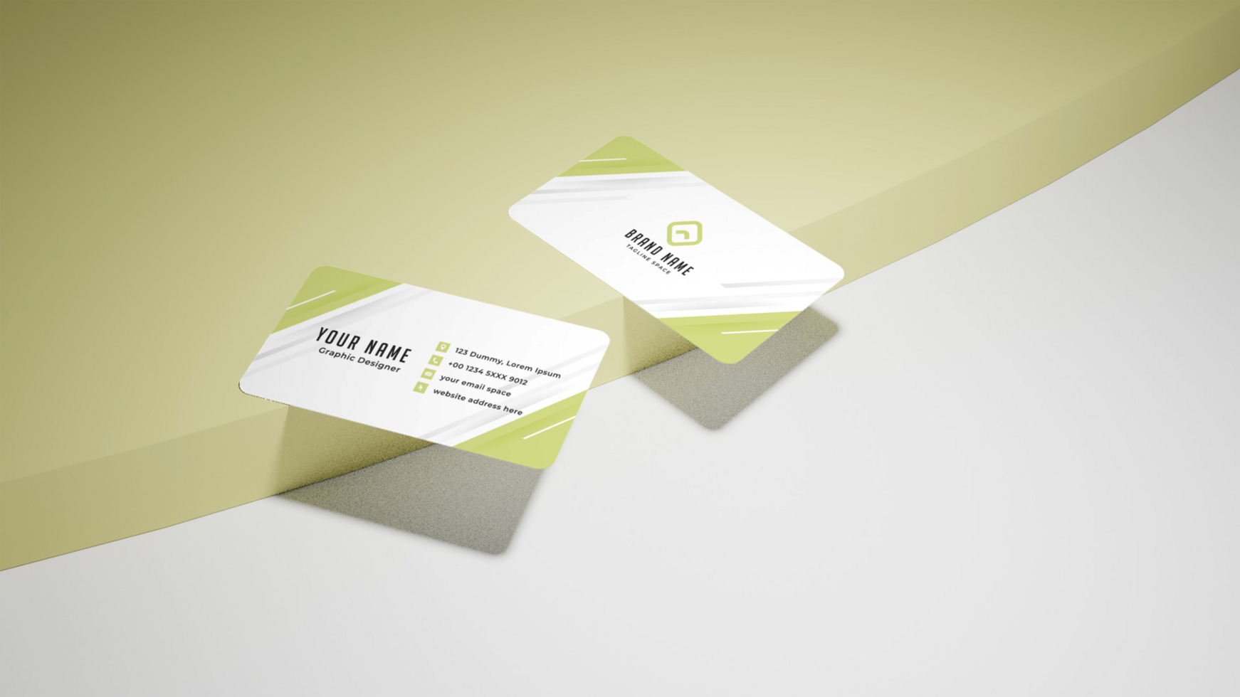 Two business cards on a yellow and green surface psd