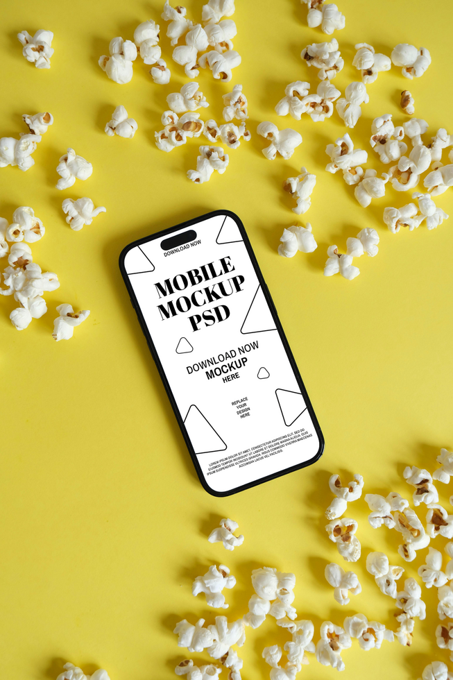 Smartphone Mockup with Popcorn on a Yellow Background psd