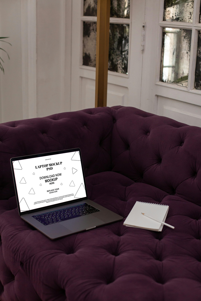 Laptop Mockup on Purple Sofa with Notebook in Modern Home Interior psd