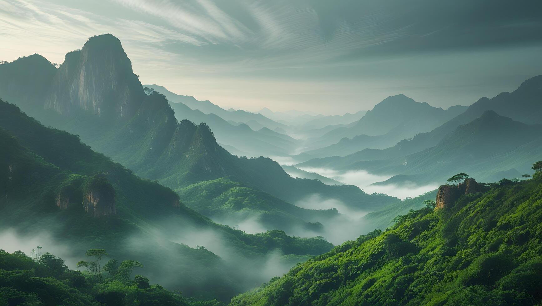 Beautiful landscape with green mountains and clouds in the morning at sunrise photo