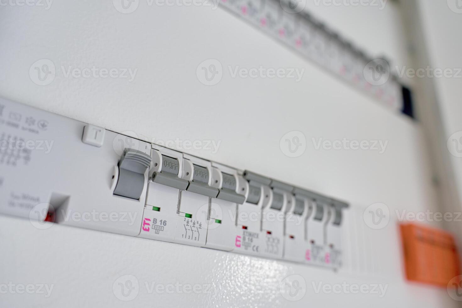 Electrical panel with circuit breakers in fuse box photo