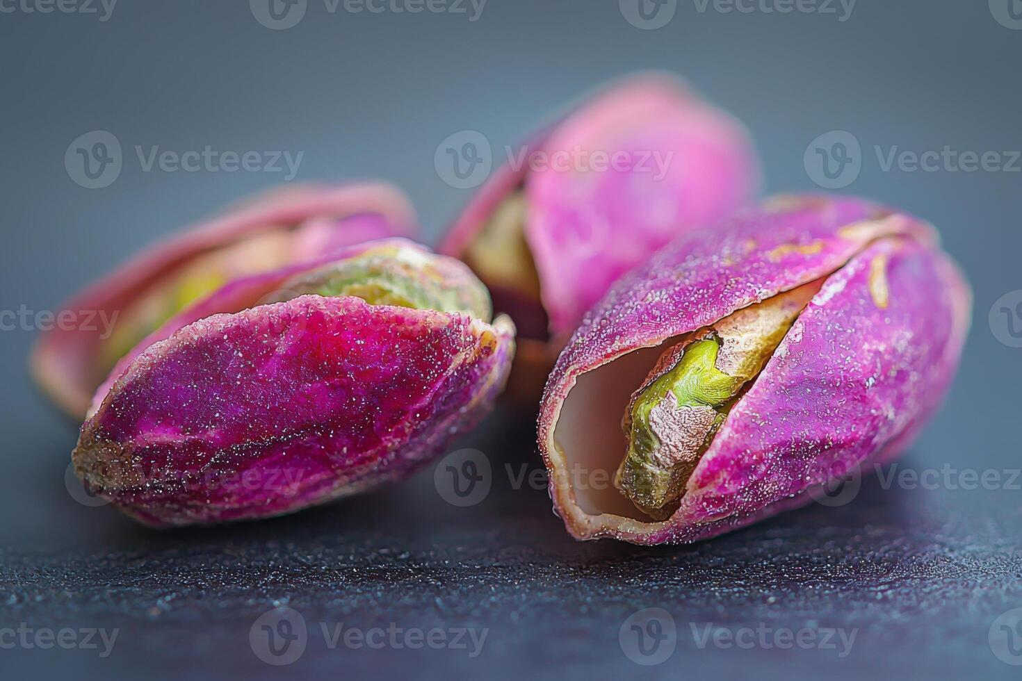 Pistachios on wooden surface photo