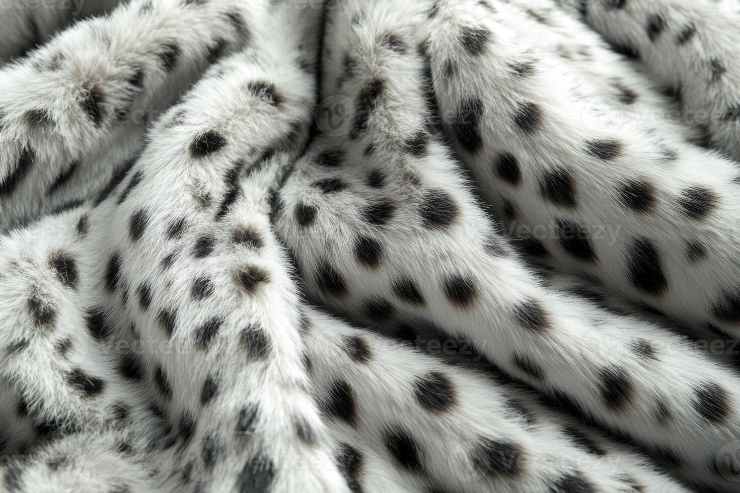 Soft and luxurious faux fur fabric with spotted texture ideal for cozy home decor and fashion designs photo