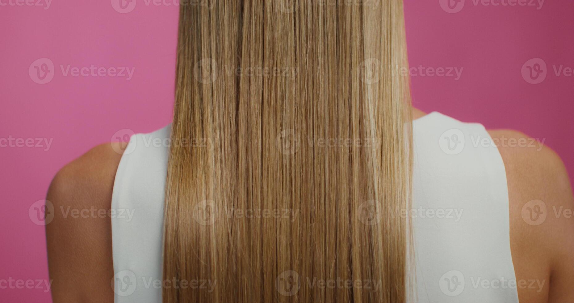 A woman with long, straight hair photo