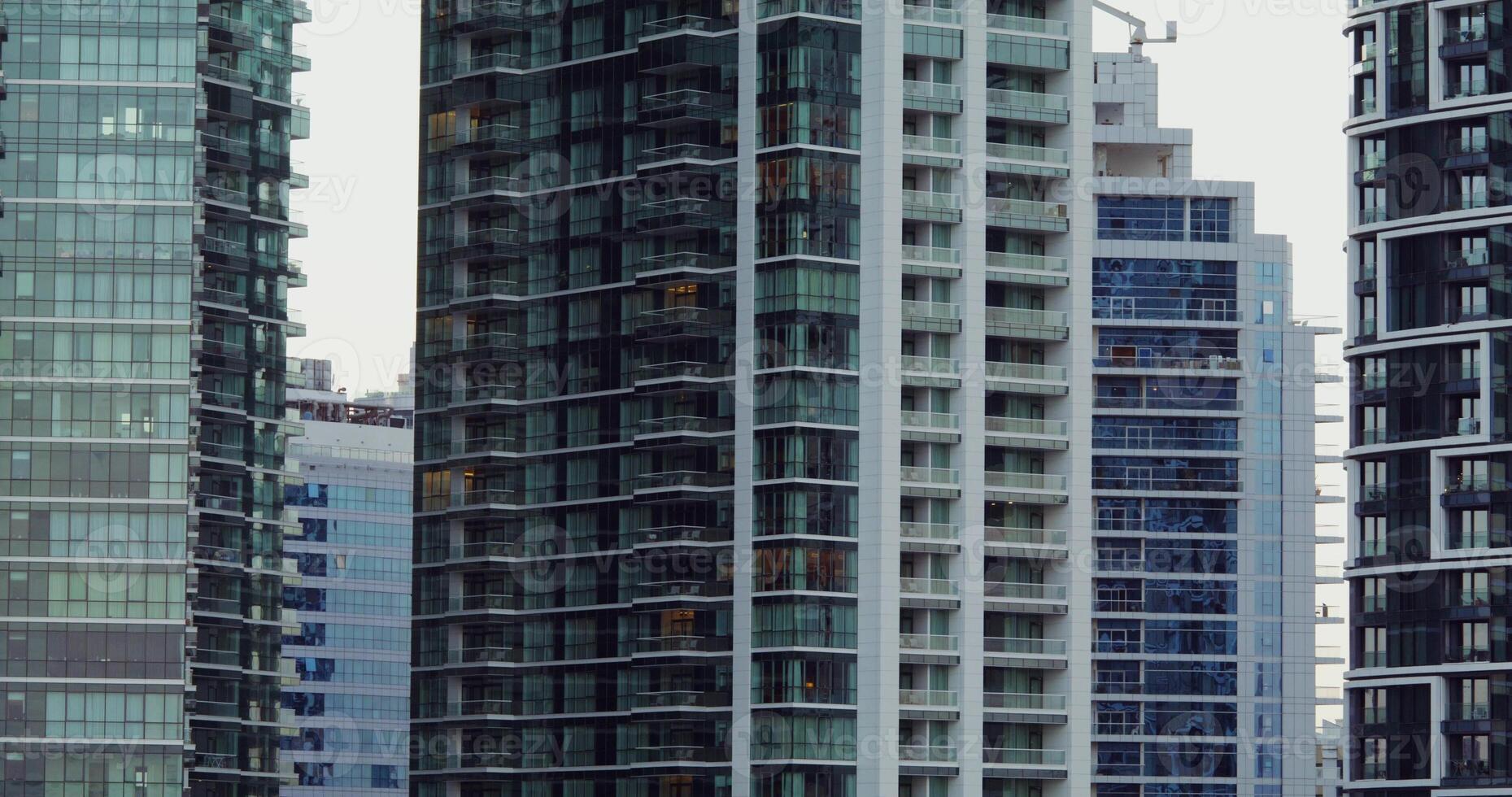 A group of tall buildings in the city photo