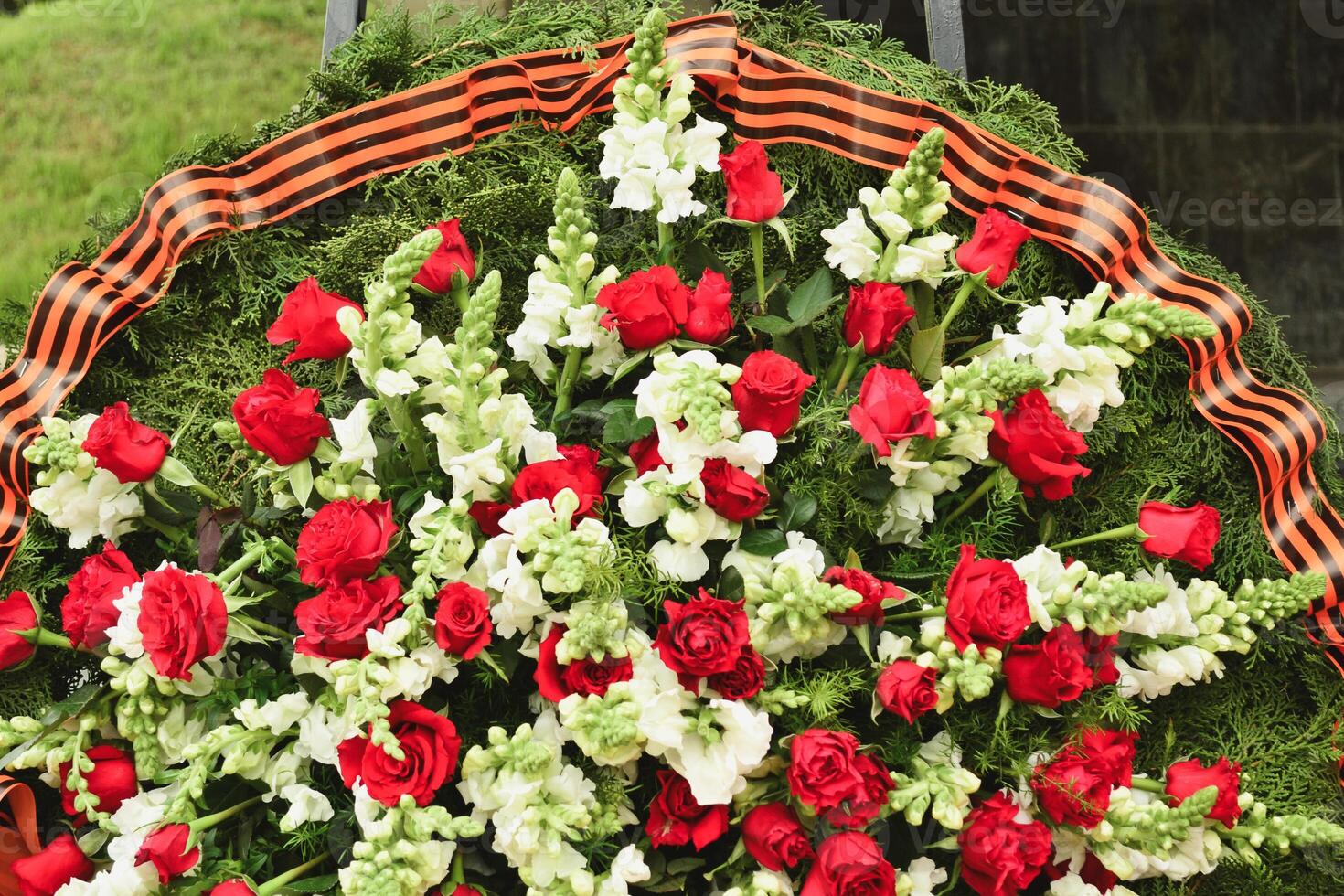 Basket with red rose and lily Saint George ribbon photo