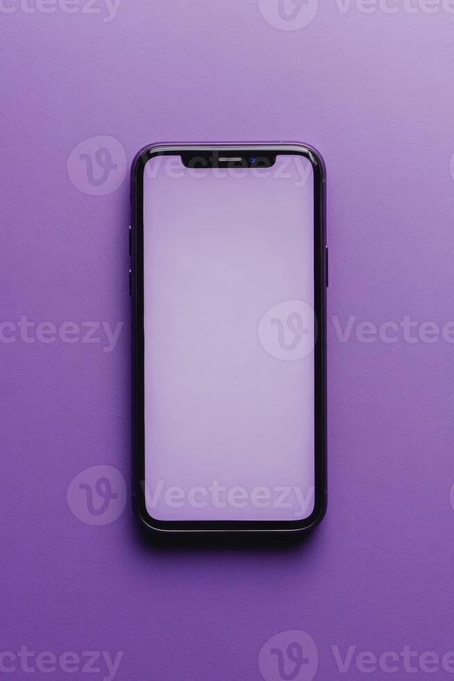 Modern smartphone with blank screen placed on vibrant purple background for creative design or marketing use photo