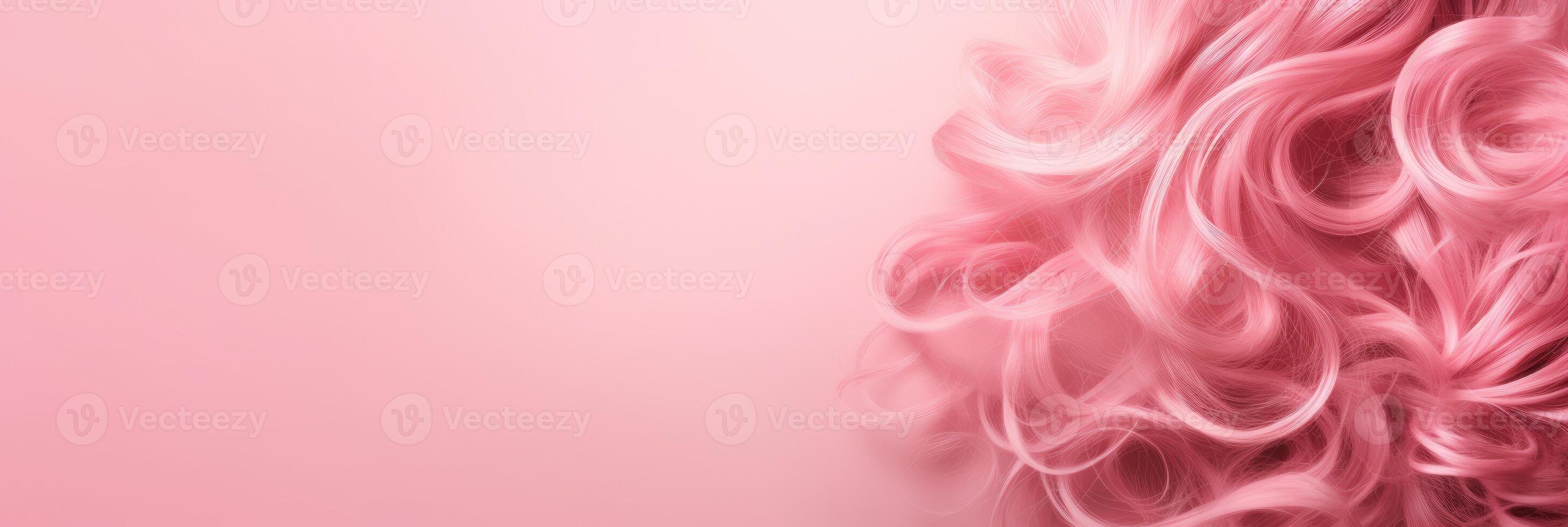 Wavy texture of healthy colored curly pink hair isolated on pink background, baner. photo