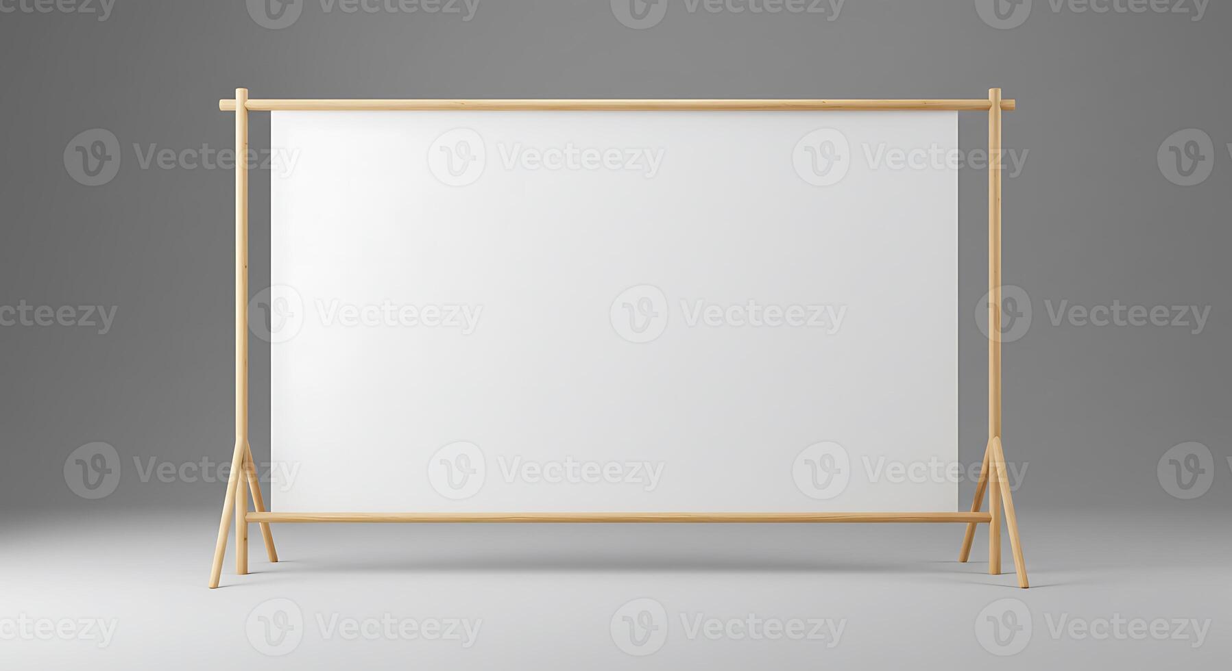 Displaying Blank Canvas on Wood Frame Against Grey Backdrop in Studio photo