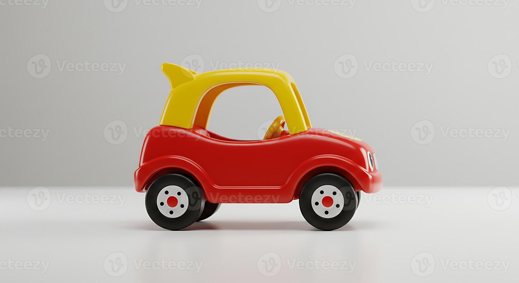 Red and Yellow Plastic Toy Car on White Surface Isolated photo