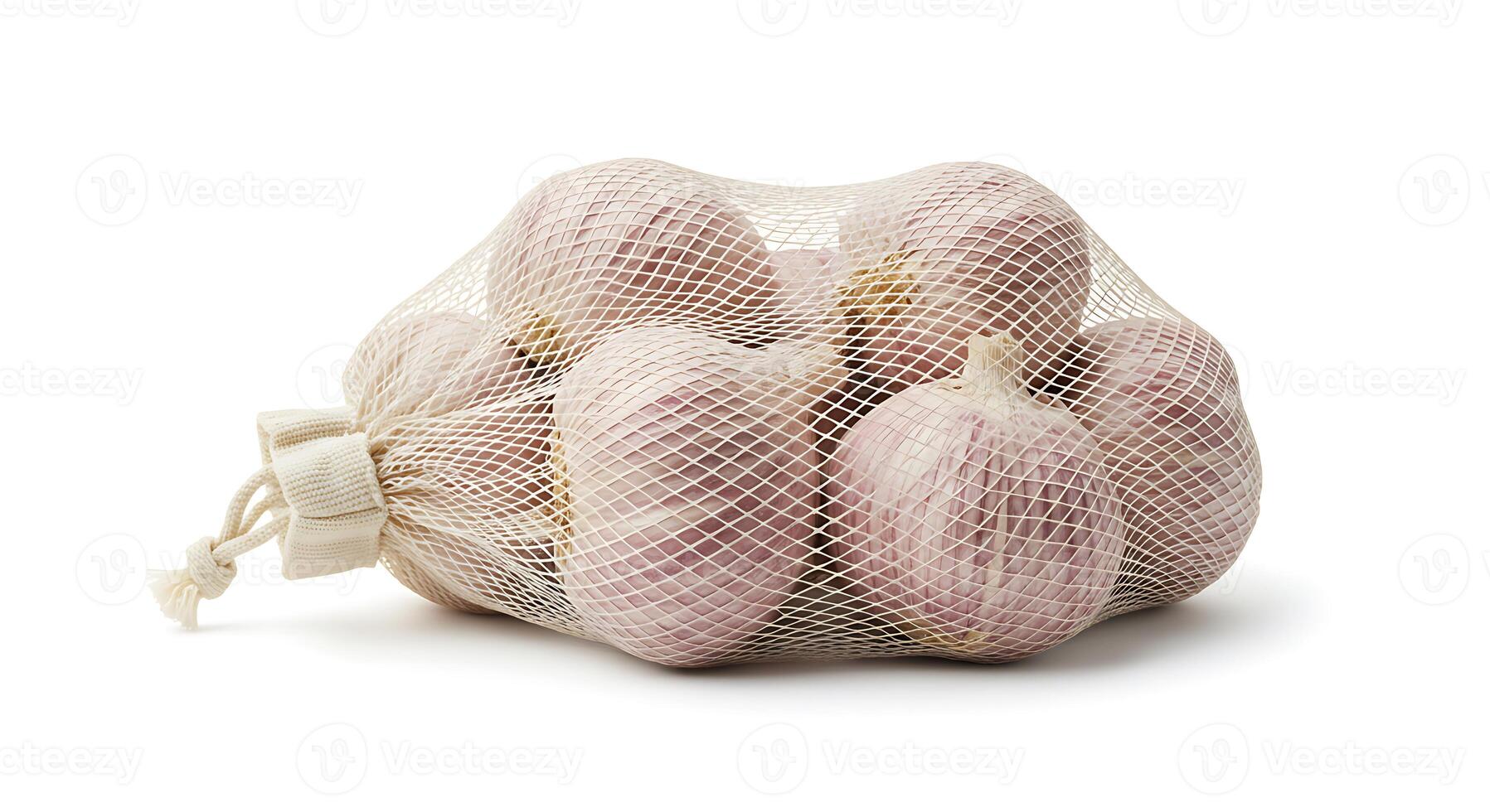 Garlic Bulbs in Net Sack Isolated on White Background Studio Shot photo