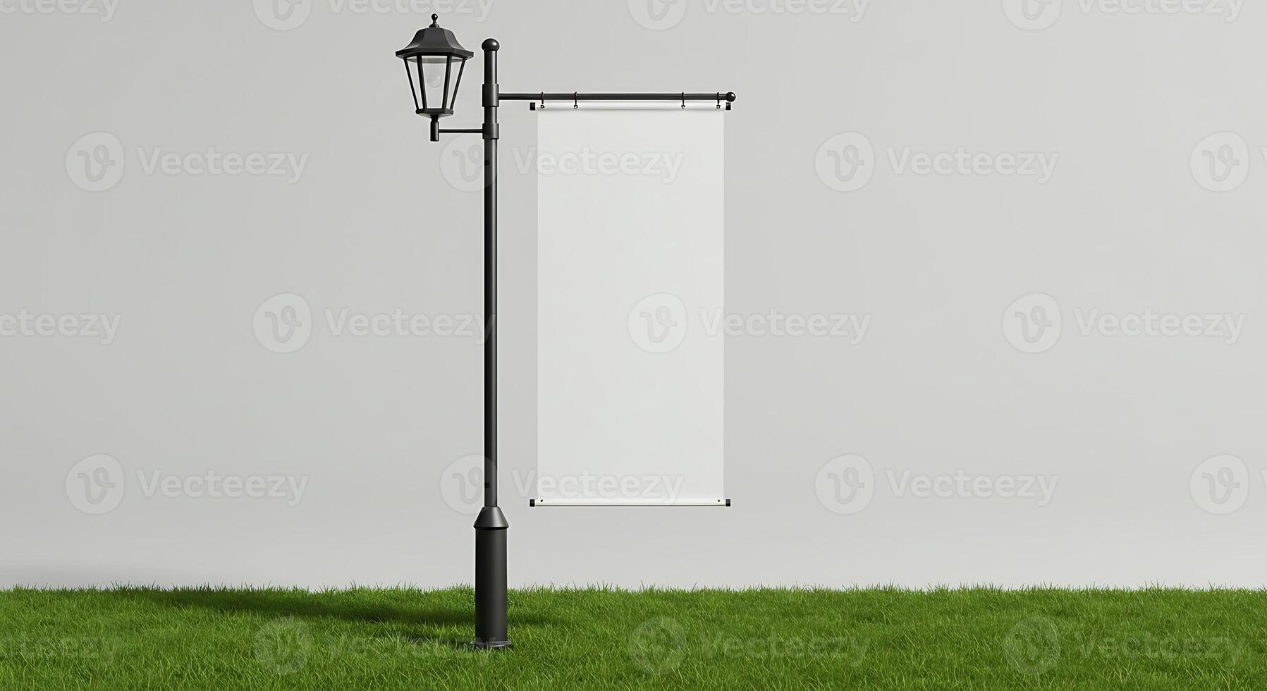 Lamp Post with Blank Banner on Grass for Outdoor Advertising photo