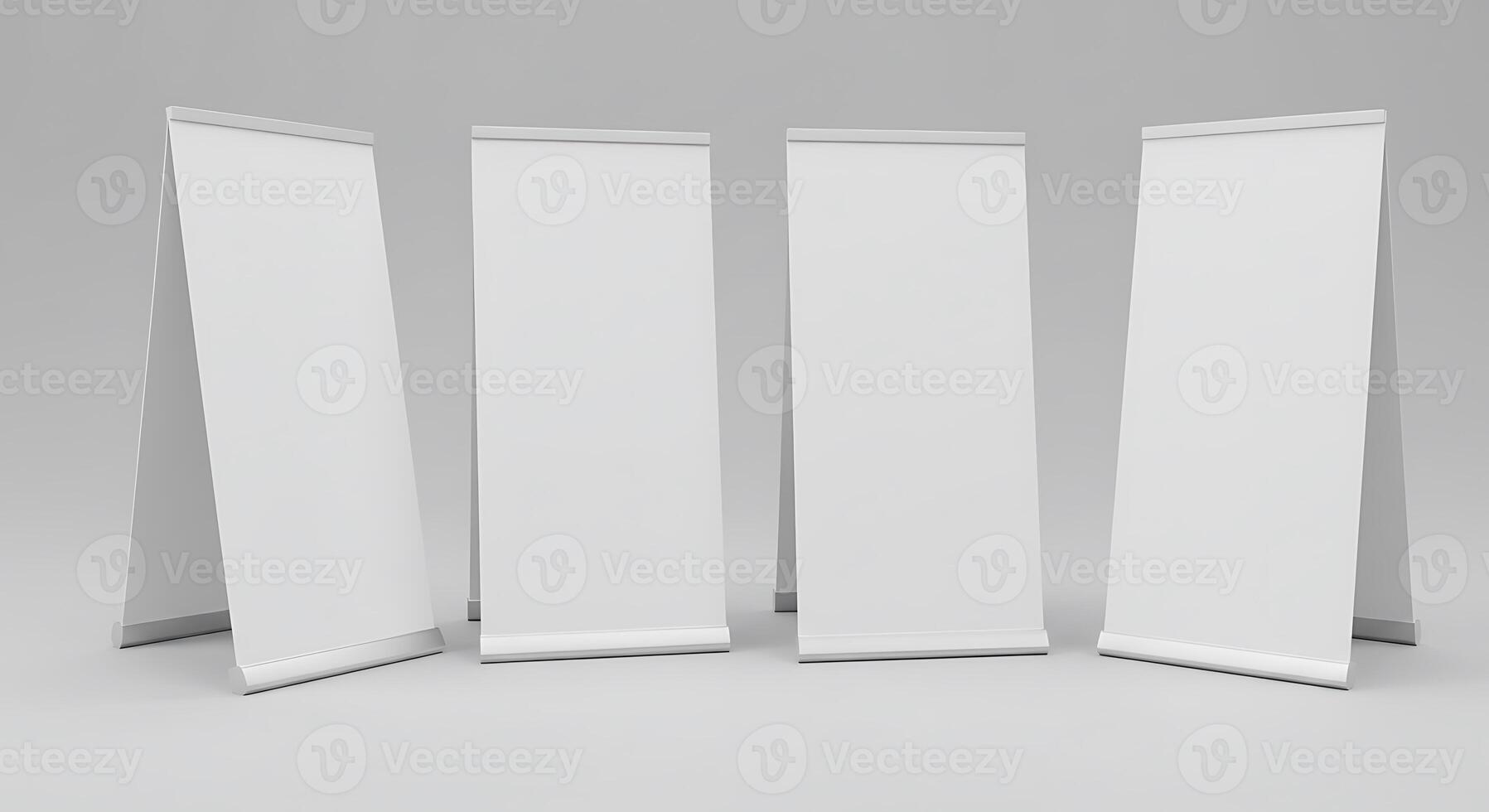 Blank Roll Up Banners Standing on Gray Backdrop for Advertising photo