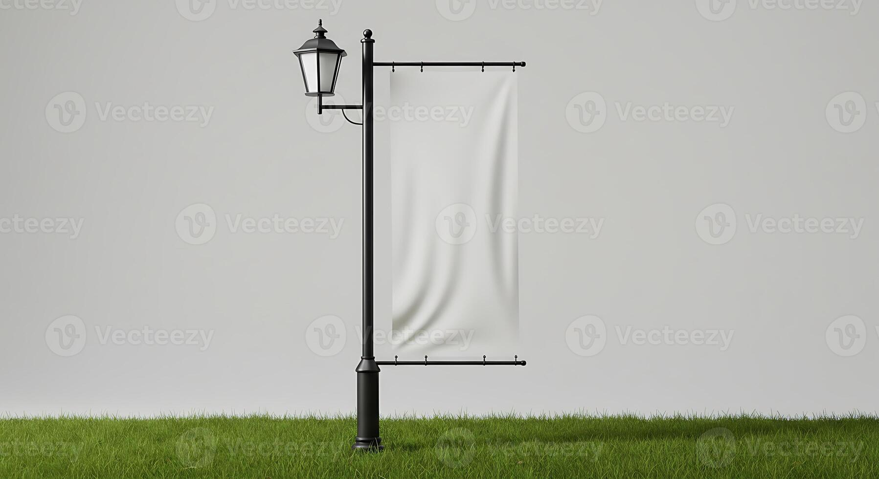 Blank Banner Mockup on Lamppost Standing on Grass with Empty Space photo