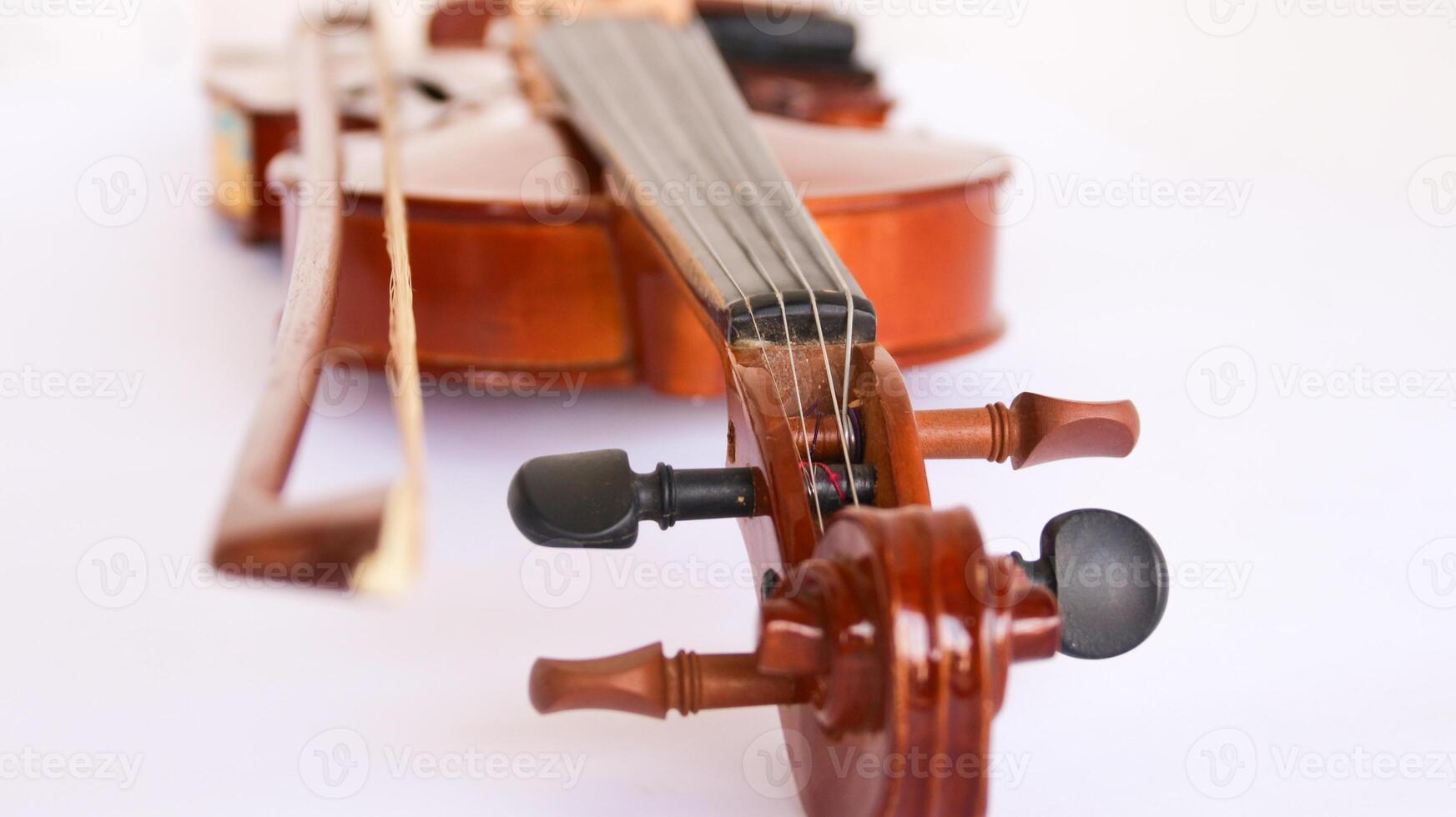 bow and violin isolated on white musical wood, photo