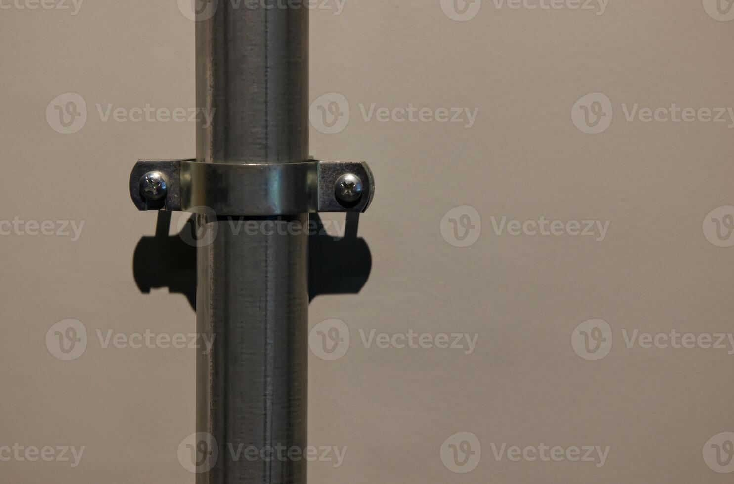 Close-up of Metallic Pole with Clamp photo