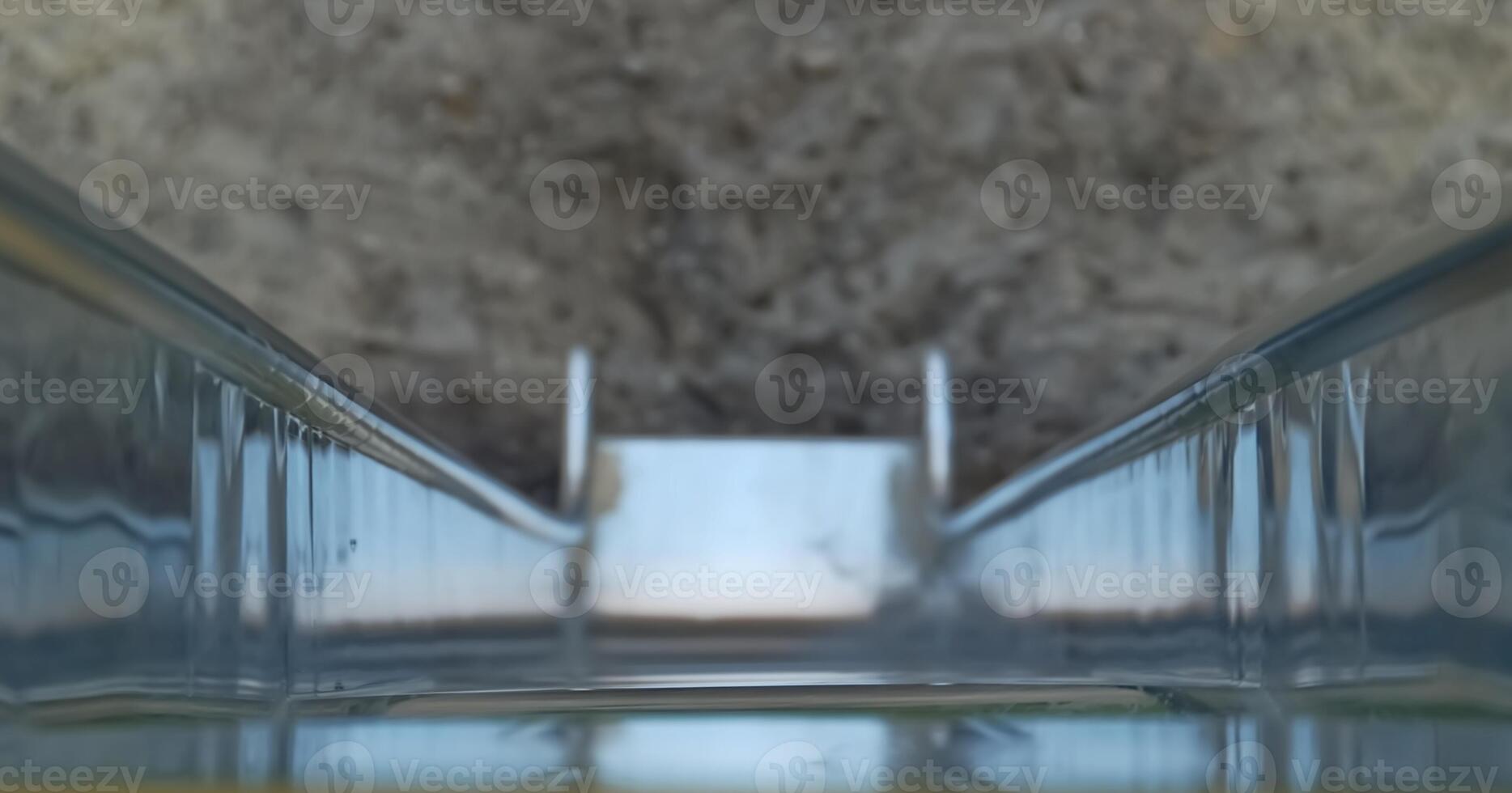 Close-Up of a Metal Slide in a Playground photo