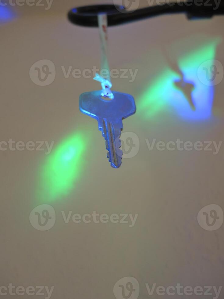 Illuminated Key with Colorful Background photo