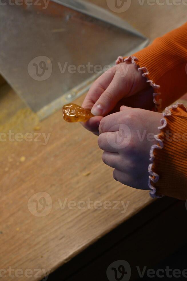 Child's Hands Holding Amber photo