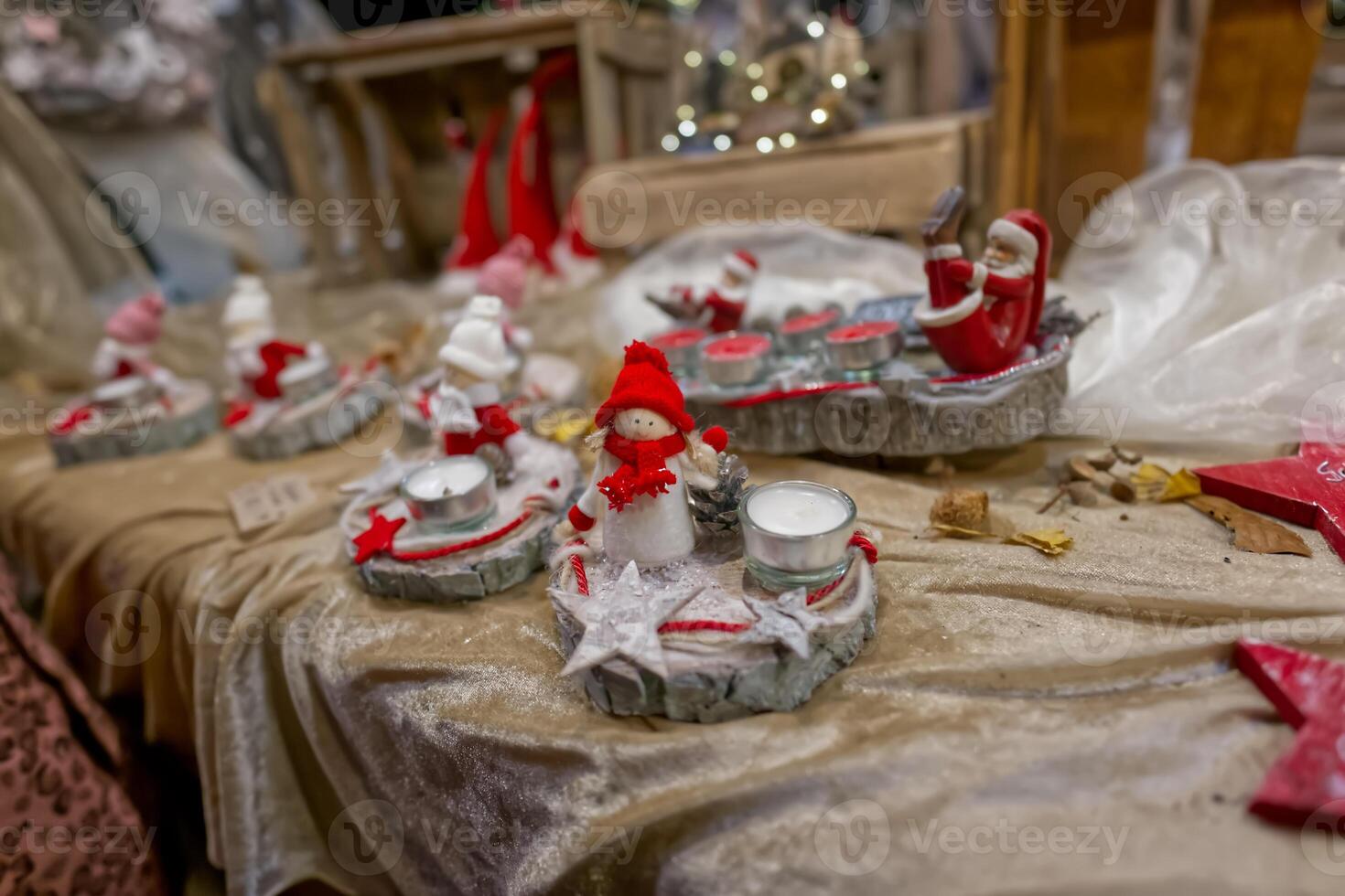 Festive Christmas Display with Santa and Snowman Figurines photo
