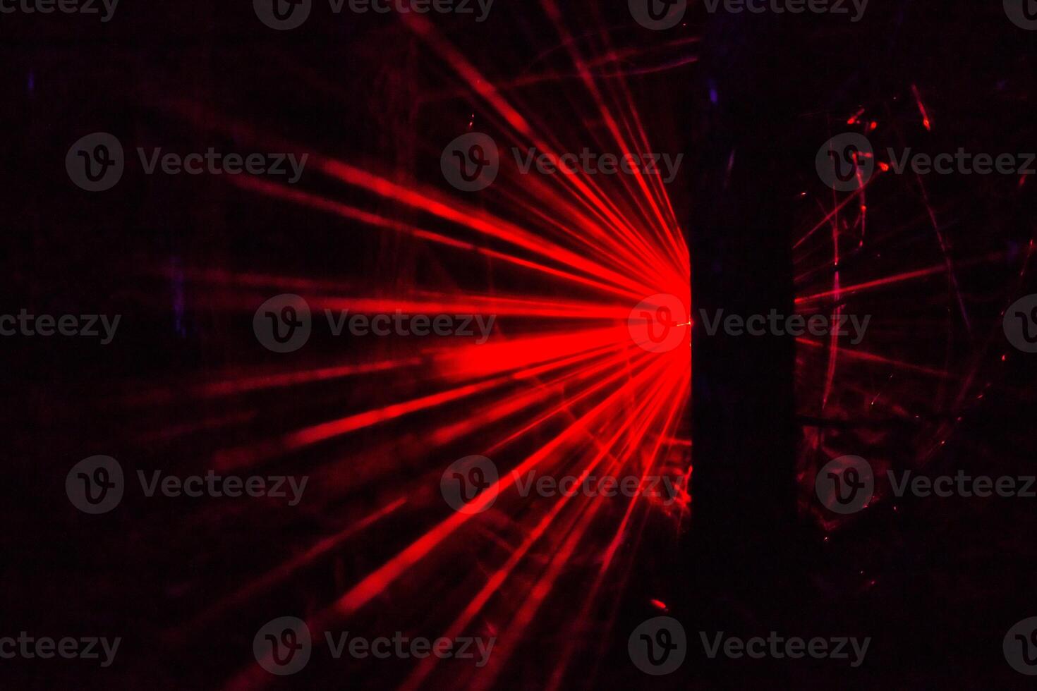 Red Laser Beams in Dark Background photo