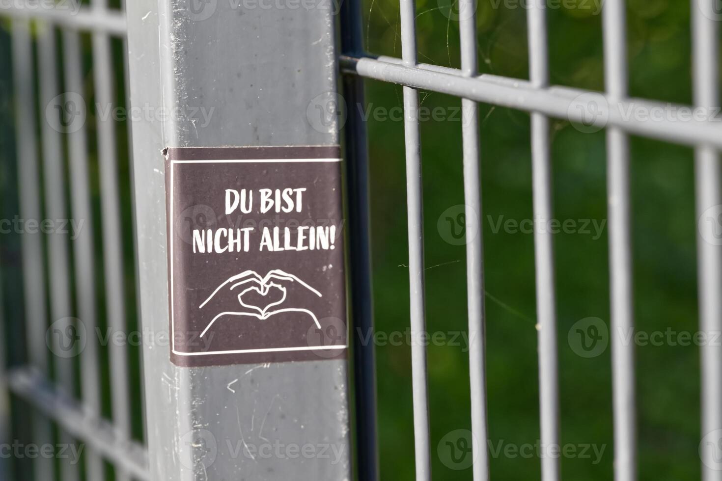 Supportive Message on Fence Sign photo