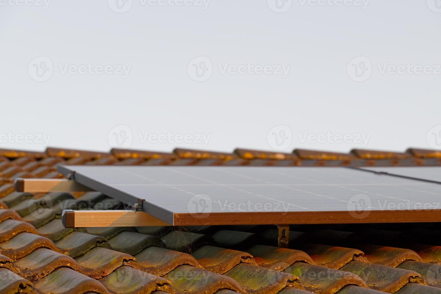 Solar Panels on Rustic Tiled Roof photo