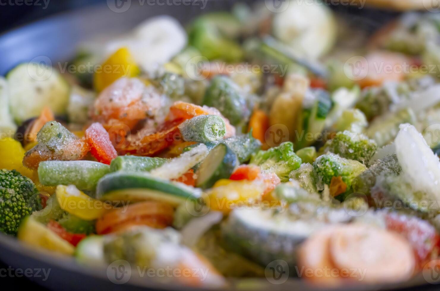 Colorful Frozen Vegetable Mix in Frying Pan photo