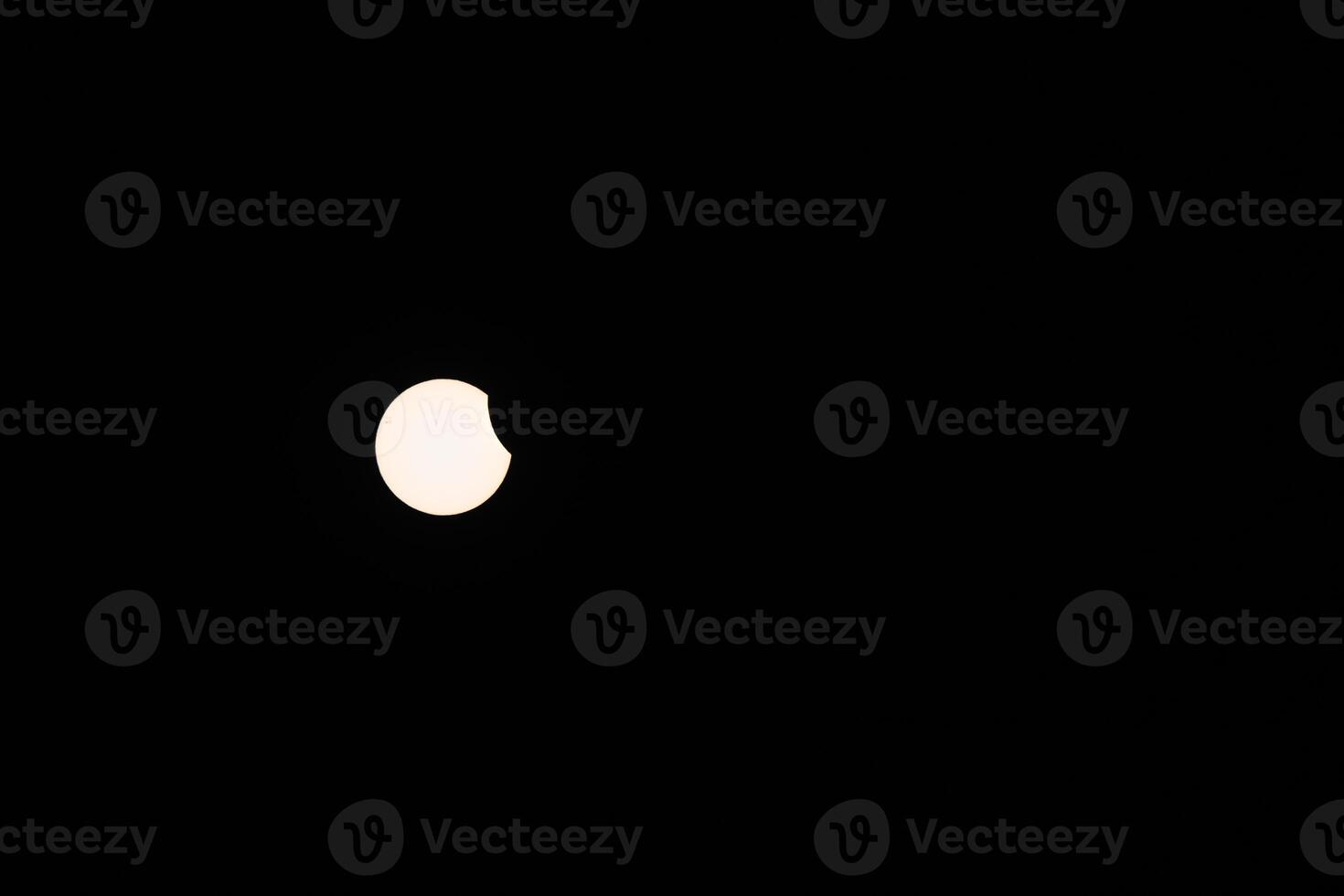 Early Beginning of Partial Solar Eclipse in the Sky from Kollund DK in March 2025 photo